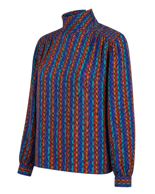 Vintage multicolor ikat geometric print mock neck blouse with smocked shoulders — front view, transparent background